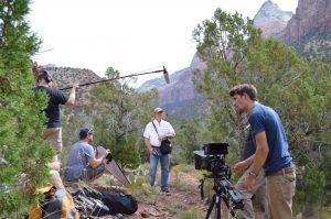 Film crew interviews Roland Lee at Zion National Park